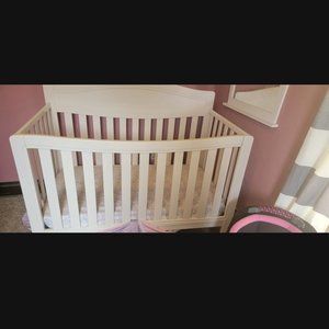 White baby crib and mattress